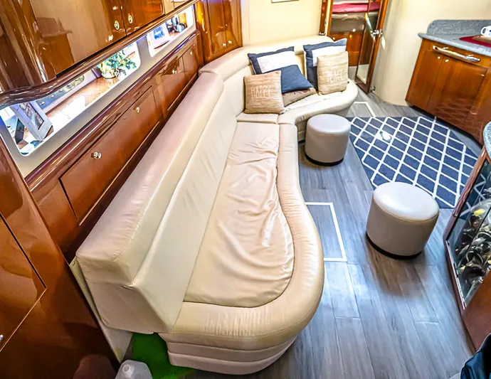 Carolina Girl Yacht Photos Pics Luxurious interior of 2002 Sea Ray 550 Sundancer yacht with plush seating and modern decor.