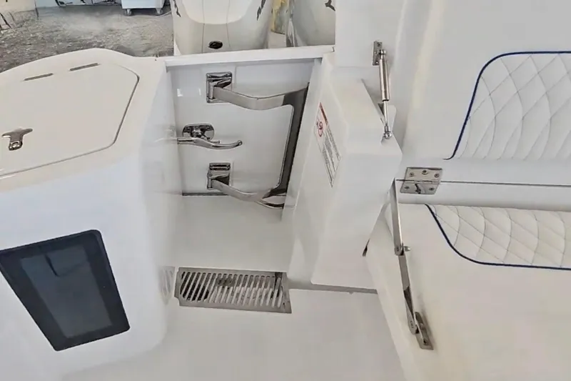  Yacht Photos Pics 2025 Intrepid 43 Nomad SE boat interior with sleek white design and modern fixtures.