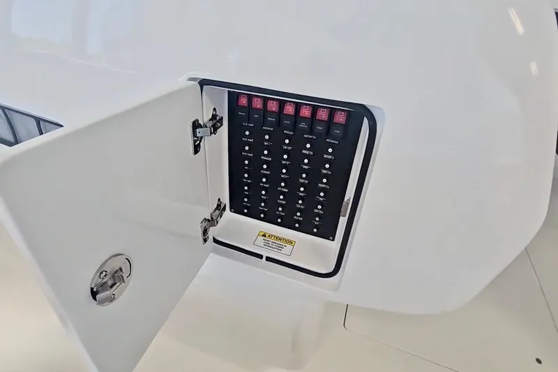  Yacht Photos Pics Electrical panel on 2025 Intrepid 43 Nomad SE boat with open access door.