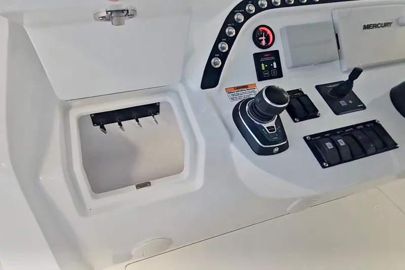  Yacht Photos Pics Control panel of 2025 Intrepid 43 Nomad SE boat with Mercury controls.