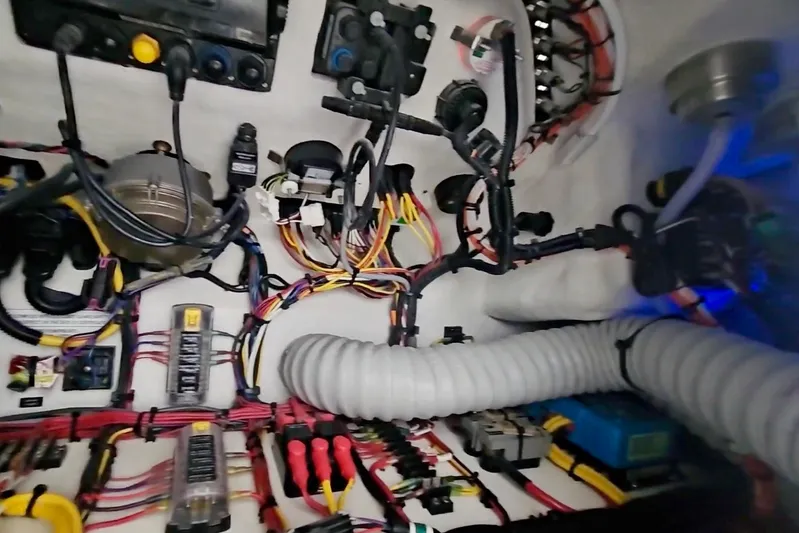  Yacht Photos Pics Electrical system of 2025 Intrepid 43 Nomad SE boat, showcasing wiring and components.