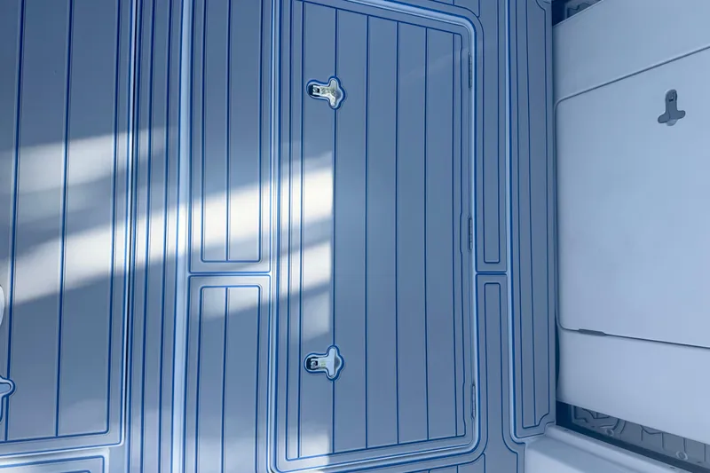  Yacht Photos Pics Deck of 2025 Intrepid 43 Nomad SE with sleek, modern design and storage compartments.