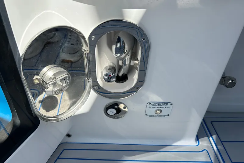 La Tuya Yacht Photos Pics 2025 Intrepid 43 Nomad SE boat fuel and water access panel.