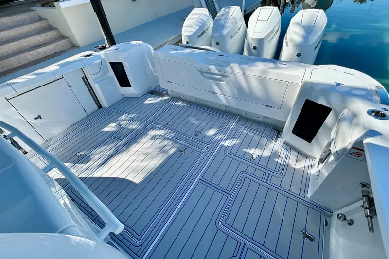 La Tuya Yacht Photos Pics 2025 Intrepid 43 Nomad SE boat deck with sleek design and multiple outboard engines.