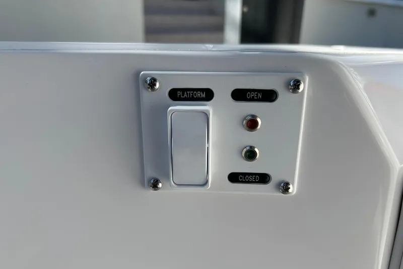 La Tuya Yacht Photos Pics Control panel on 2025 Intrepid 43 Nomad SE boat, featuring platform open/closed indicators.