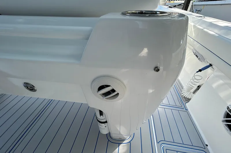 La Tuya Yacht Photos Pics 2025 Intrepid 43 Nomad SE boat deck with white and blue detailing.