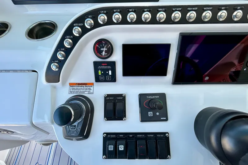 La Tuya Yacht Photos Pics Control panel of 2025 Intrepid 43 Nomad SE boat with various switches and displays.