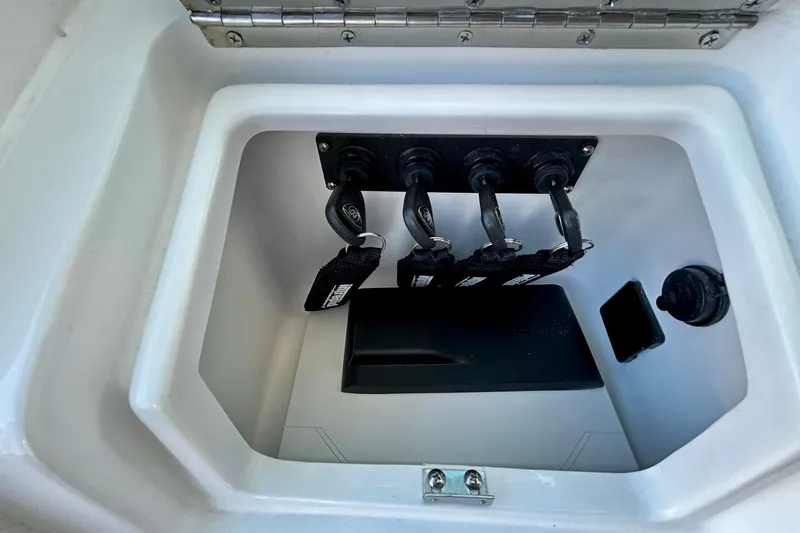 La Tuya Yacht Photos Pics Storage compartment with key fobs in 2025 Intrepid 43 Nomad SE boat.