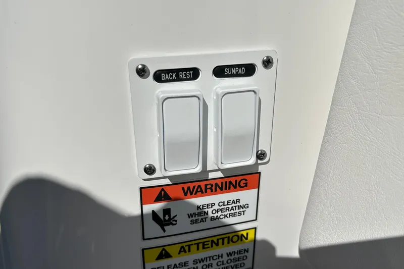 La Tuya Yacht Photos Pics Control panel with backrest and sunpad switches on 2025 Intrepid 43 Nomad SE boat.