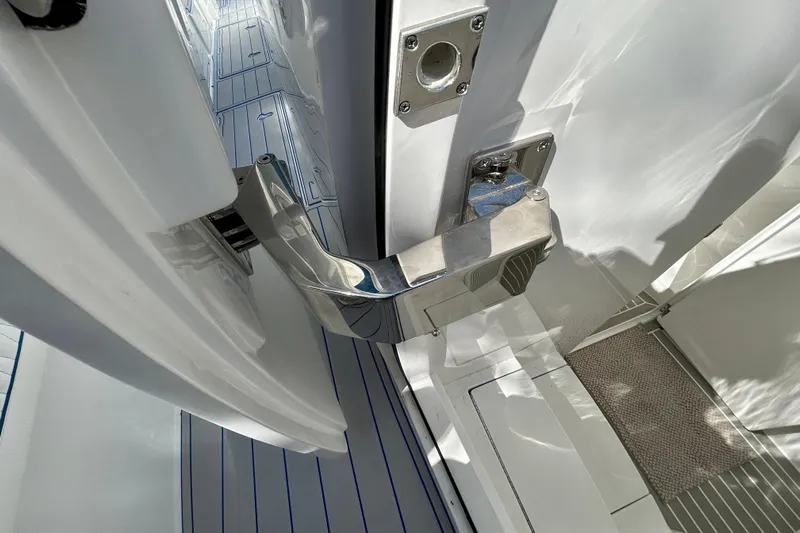 La Tuya Yacht Photos Pics 2025 Intrepid 43 Nomad SE boat door hinge detail with sleek, modern design.