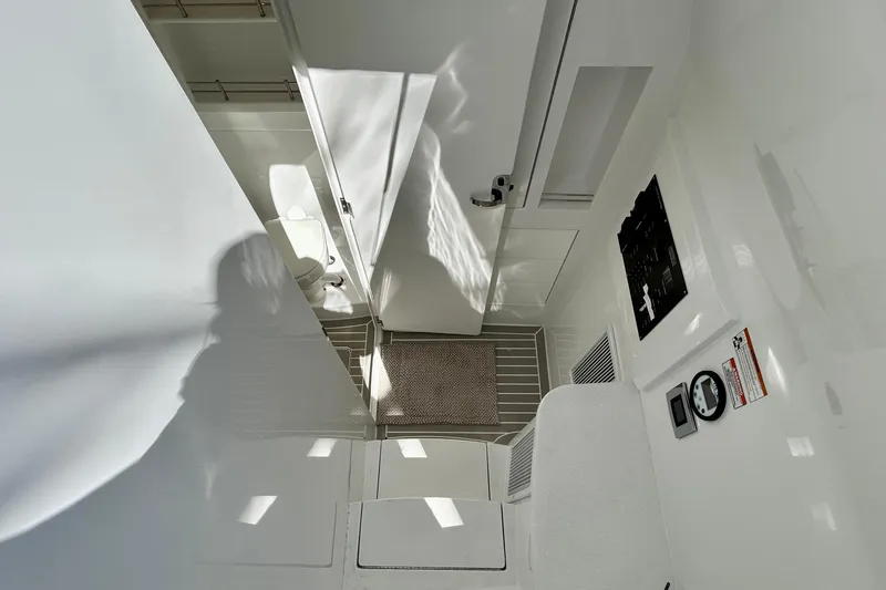 La Tuya Yacht Photos Pics Interior of 2025 Intrepid 43 Nomad SE, featuring modern bathroom and sleek design elements.