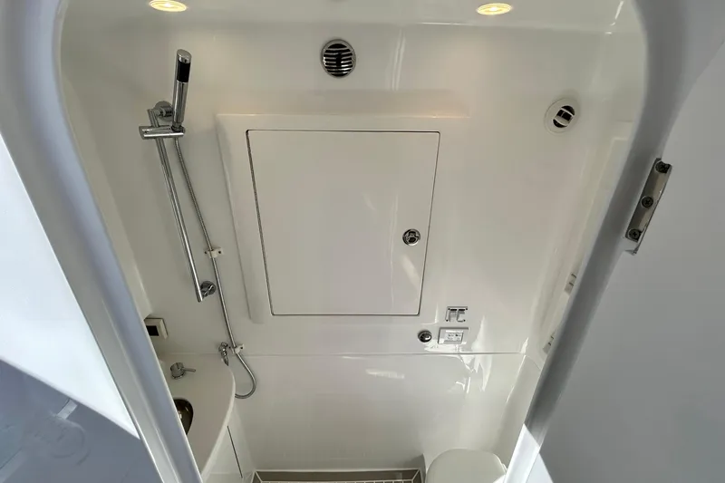 La Tuya Yacht Photos Pics 2025 Intrepid 43 Nomad SE boat bathroom with modern fixtures and sleek design.