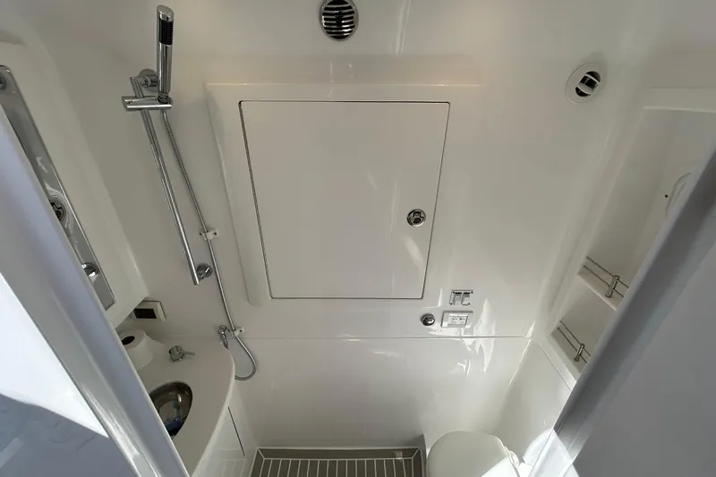 La Tuya Yacht Photos Pics 2025 Intrepid 43 Nomad SE boat bathroom with modern fixtures and sleek design.