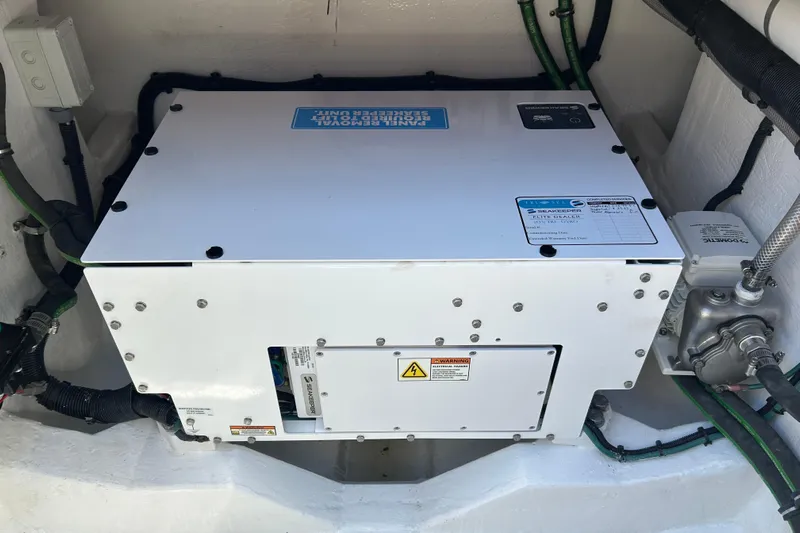 La Tuya Yacht Photos Pics Engine compartment of 2025 Intrepid 43 Nomad SE with Seakeeper stabilizer unit.