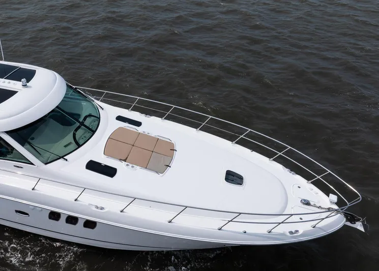 Double H Yacht Photos Pics 2008 Sea Ray 60 Sundancer yacht cruising on open water.