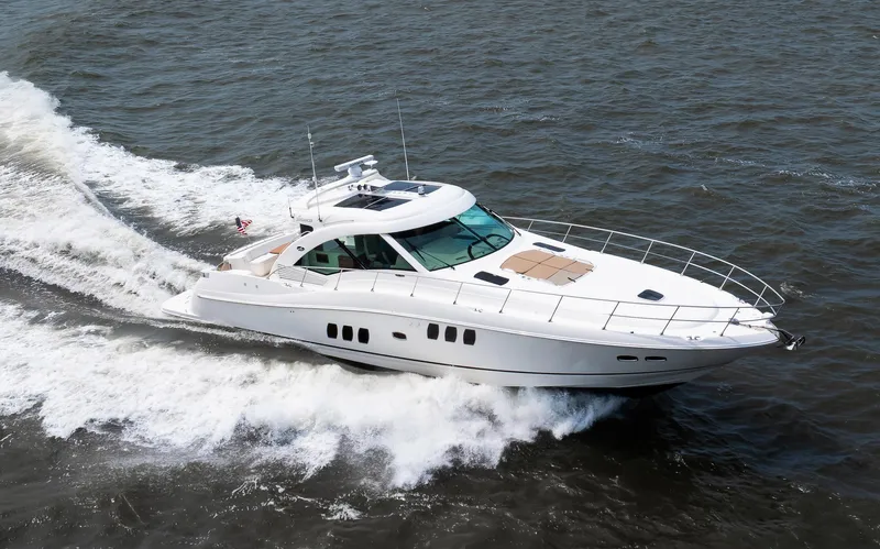 Double H Yacht Photos Pics 2008 Sea Ray 60 Sundancer yacht cruising on open water.