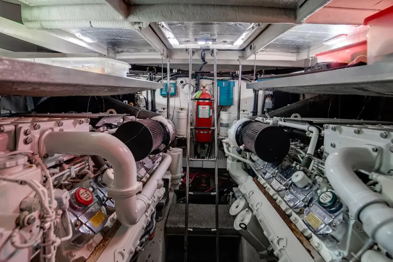 Double H Yacht Photos Pics Engine room of 2008 Sea Ray 60 Sundancer yacht, featuring dual engines and safety equipment.