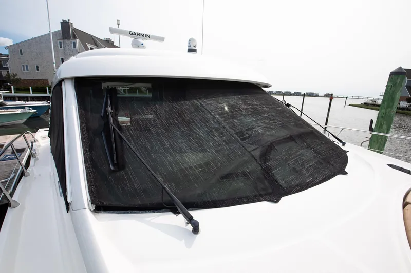 Double H Yacht Photos Pics 2008 Sea Ray 60 Sundancer yacht with covered windshield at marina.