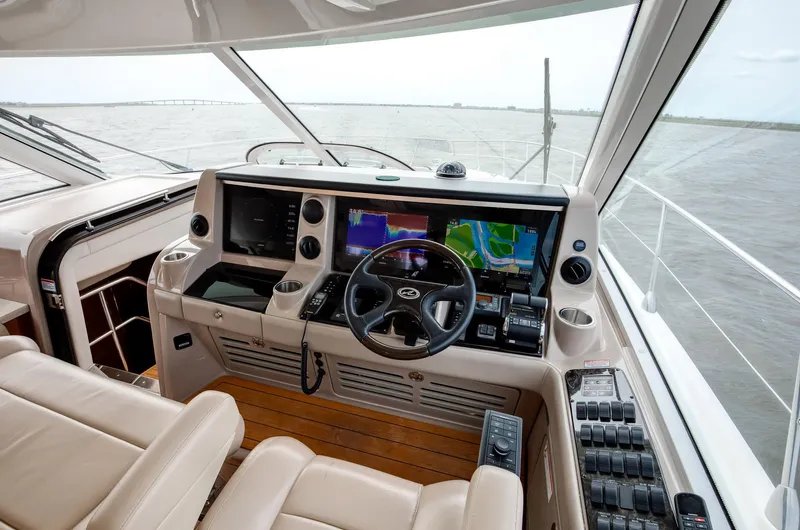 Double H Yacht Photos Pics Helm of 2008 Sea Ray 60 Sundancer yacht with modern navigation equipment.