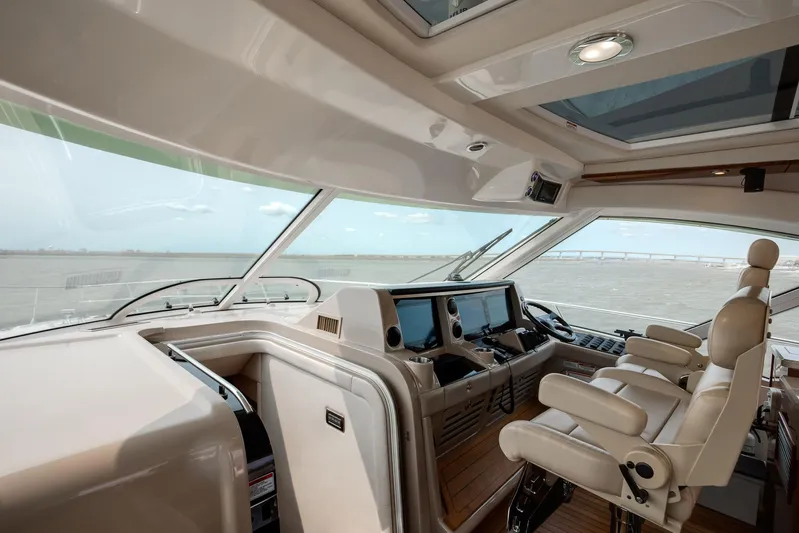 Double H Yacht Photos Pics Interior view of 2008 Sea Ray 60 Sundancer yacht cockpit with modern navigation equipment.