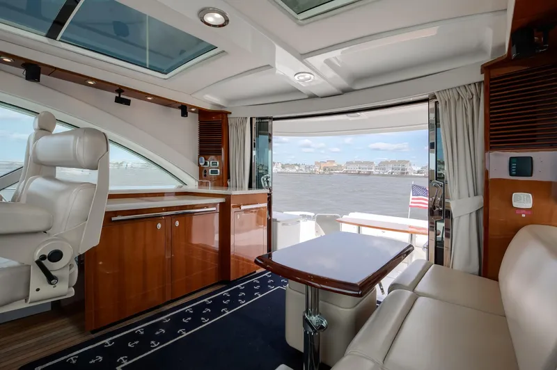 Double H Yacht Photos Pics Luxurious interior of 2008 Sea Ray 60 Sundancer yacht with river view.