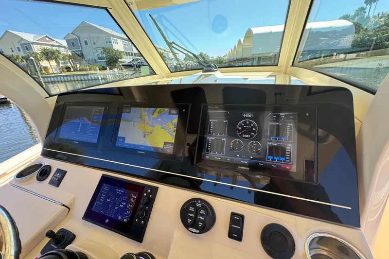  Yacht Photos Pics 2019 Scout 355 LXF boat dashboard with advanced navigation and control displays.
