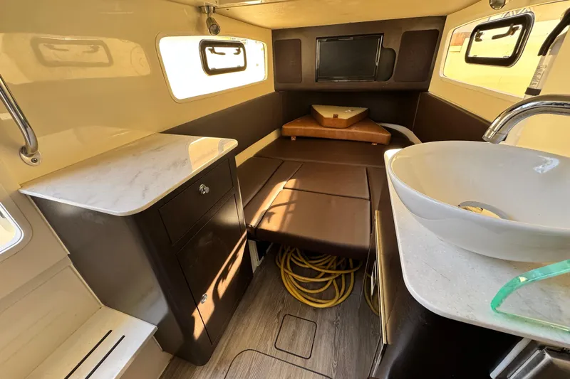  Yacht Photos Pics 2019 Scout 355 LXF cabin interior with modern amenities and stylish design.