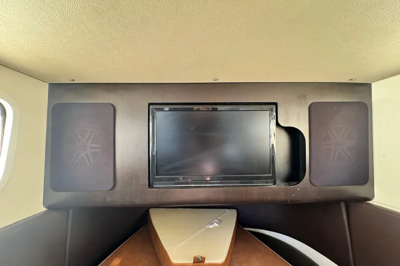  Yacht Photos Pics Interior of 2019 Scout 355 LXF boat with TV and speakers.