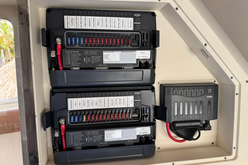  Yacht Photos Pics Electrical panel of a 2019 Scout 355 LXF boat with labeled circuit breakers.