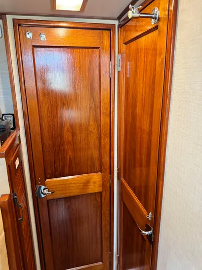 Carolina Girl Yacht Photos Pics Wooden interior door of a 1985 Viking Express boat.