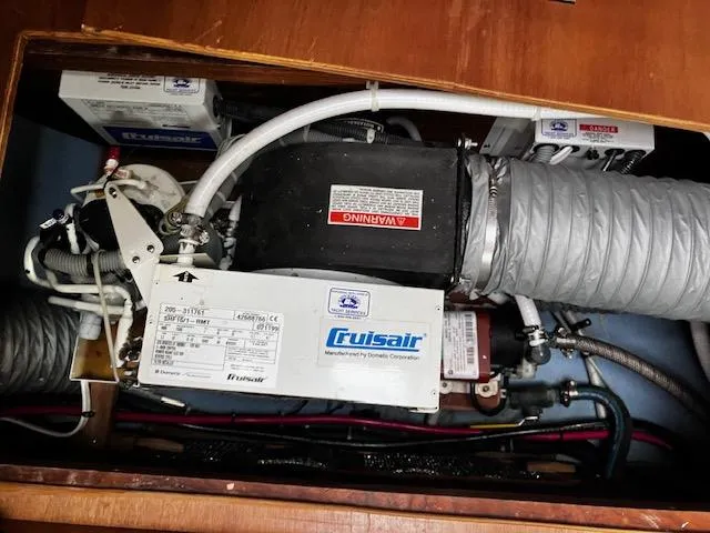 Indigo Yacht Photos Pics Engine compartment of a 2002 Sabre 362 with Cruisair system and ductwork.