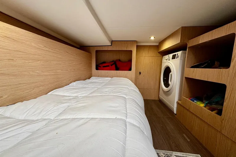 Changes In Latitude Yacht Photos Pics Interior of 2022 Beneteau Swift Trawler 41 Fly with bed and washing machine.