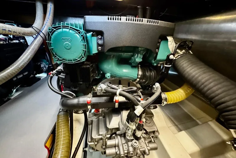 Changes In Latitude Yacht Photos Pics Engine room of 2022 Beneteau Swift Trawler 41 Fly, showcasing mechanical components.