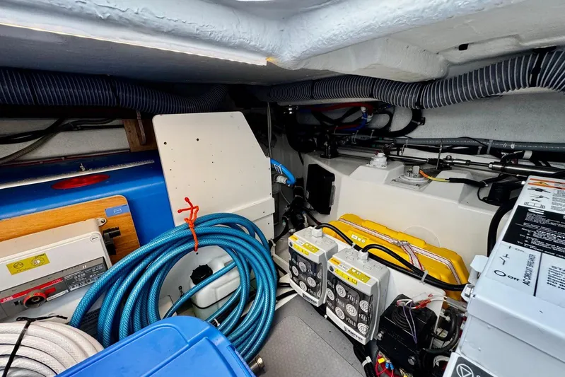 Changes In Latitude Yacht Photos Pics Engine room of 2022 Beneteau Swift Trawler 41 Fly with cables and equipment.