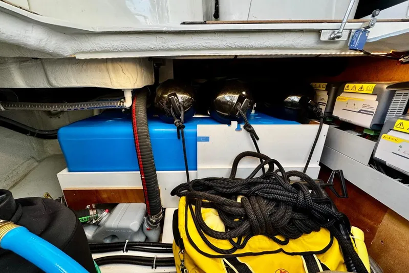 Changes In Latitude Yacht Photos Pics 2022 Beneteau Swift Trawler 41 Fly engine room with equipment and storage.