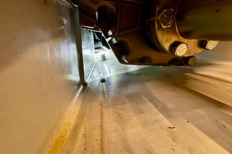 Changes In Latitude Yacht Photos Pics Engine compartment of 2022 Beneteau Swift Trawler 41 Fly, showcasing mechanical components.