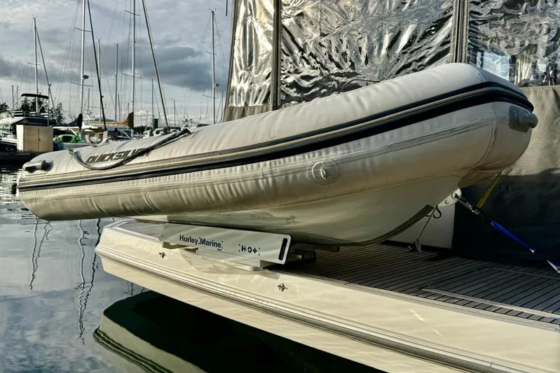 Changes In Latitude Yacht Photos Pics Inflatable boat on Beneteau Swift Trawler 41 Fly, 2022 model, docked at marina.