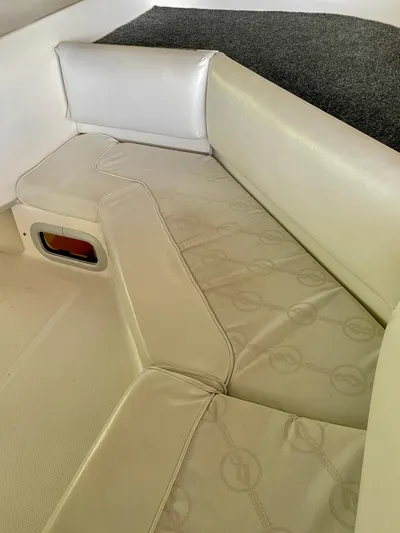 Casting Shadows Yacht Photos Pics 1998 Bayliner 3988 Command Bridge Motoryacht interior with beige seating and textured upholstery.