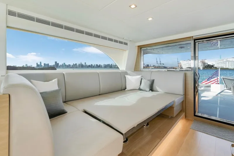 Valiant Yacht Photos Pics Luxurious Horizon E81 yacht interior with city skyline view, 2022 model.