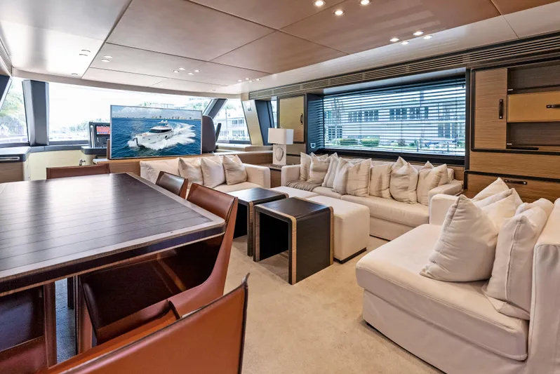  Yacht Photos Pics Luxurious interior of 2016 Azimut Magellano 76 yacht with elegant seating and dining area.