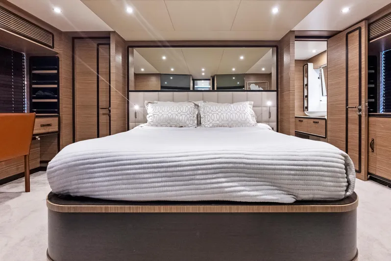  Yacht Photos Pics Luxurious bedroom interior of 2016 Azimut Magellano 76 yacht with modern design.