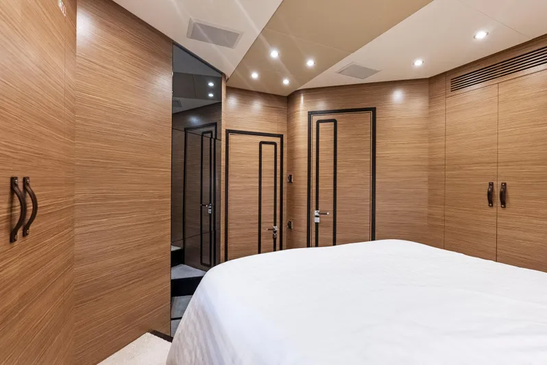  Yacht Photos Pics Luxurious interior of 2016 Azimut Magellano 76 yacht with wood paneling and modern design.