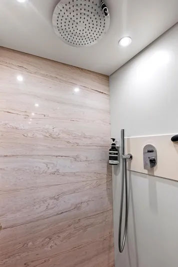  Yacht Photos Pics Luxury shower in 2016 Azimut Magellano 76 yacht with modern fixtures and elegant design.