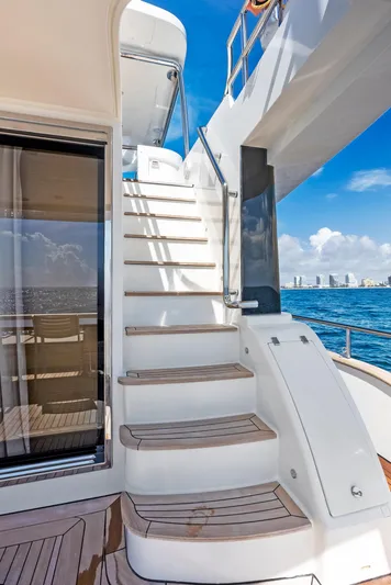  Yacht Photos Pics Staircase on 2016 Azimut Magellano 76 yacht with ocean view.
