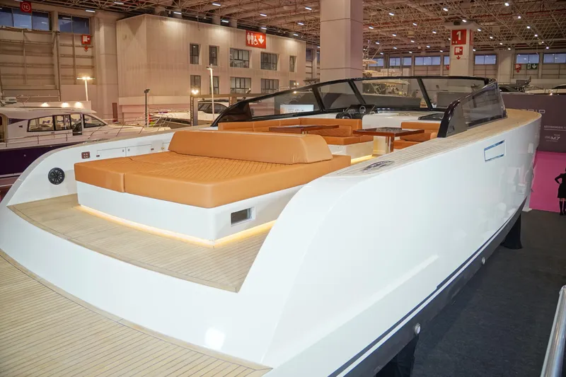 Yacht Photos Pics Luxury Phantom Spook 62 yacht, 2025 model, with sleek design and spacious deck at indoor exhibition.