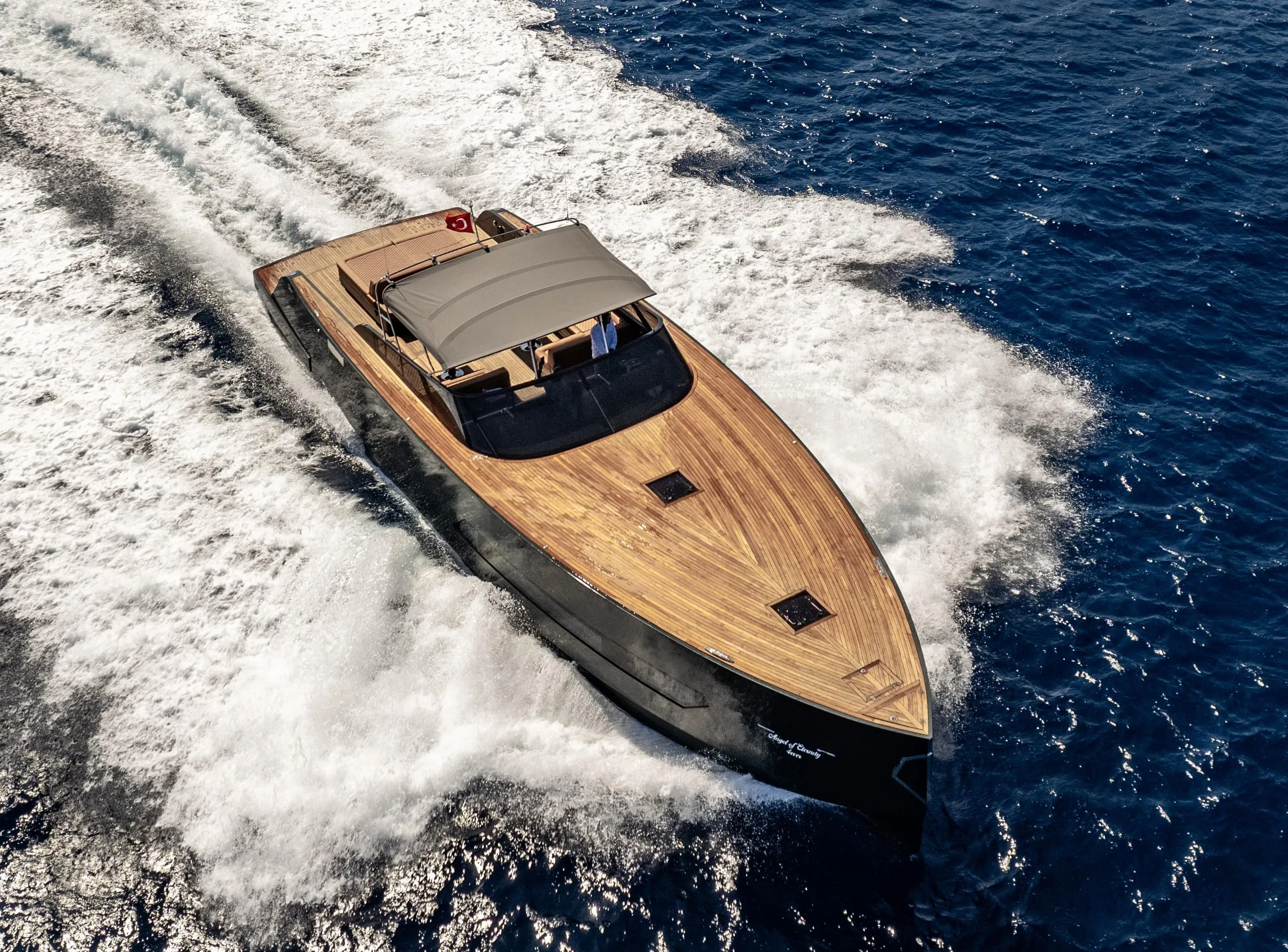 Luxurious Phantom Spook 62 yacht cruising on open sea, 2026 model.