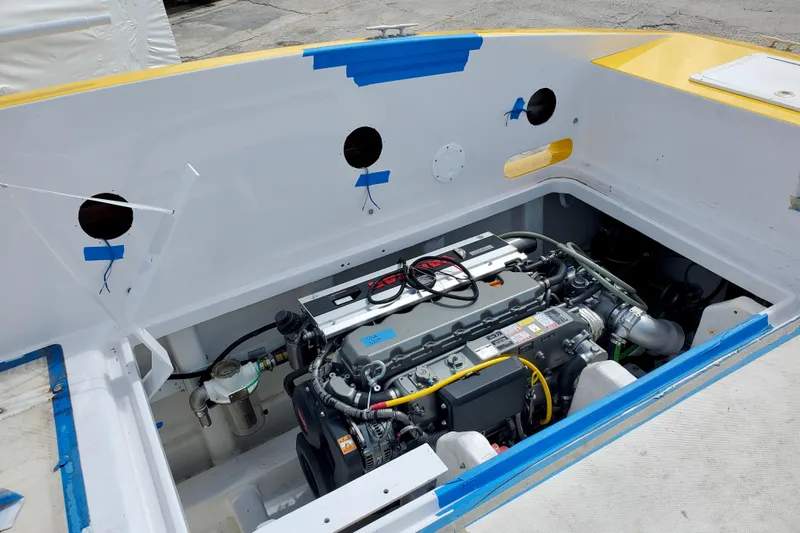  Yacht Photos Pics 2005 Thriller Powerboats Super Cat 55 engine compartment, showcasing detailed mechanical components.