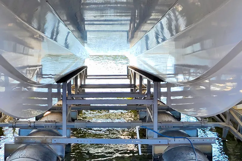  Yacht Photos Pics Underneath view of a 2005 Thriller Powerboats Super Cat 55 on a lift.