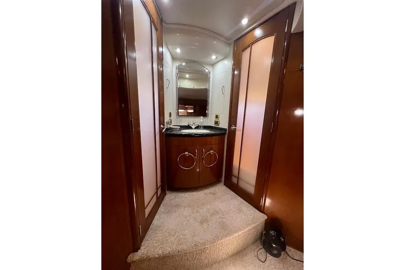 Our Trade Yacht Photos Pics Luxurious interior of 2006 Carver 56 Voyager yacht with elegant wood finishes.