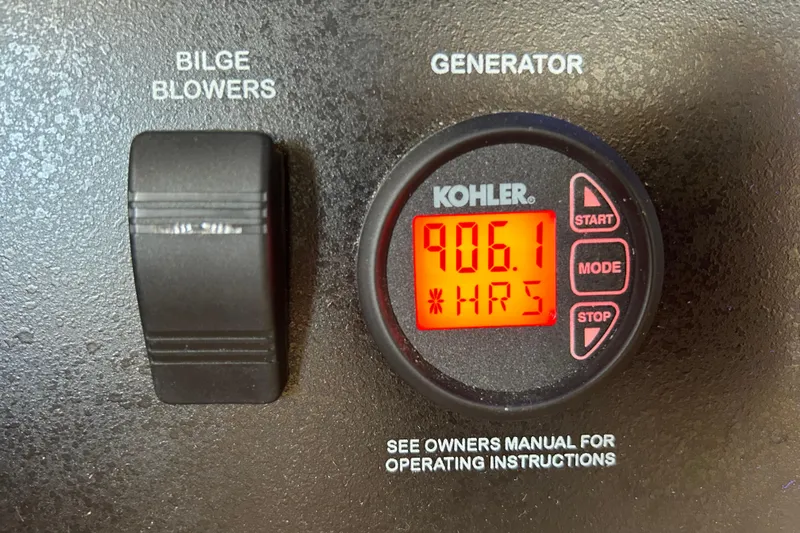  Yacht Photos Pics Control panel of 2016 Sea Ray 400 Sundancer with Kohler generator display showing 906.1 hours.